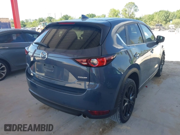 2021 Mazda CX-5 Touring with VIN JM3KFBCM3M0406787, listed as a IAAI auction lot 41800564 with 42,254 mi miles and . Bid and sale history available at carsss.com. Image 4.