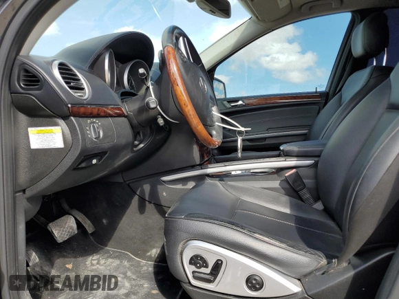 2011 Mercedes-Benz GL-Class GL 450 with VIN 4JGBF7BE2BA654807, listed as a Copart auction lot 77133244 with 133,748 mi miles and Salvage Title. Bid and sale history available at carsss.com. Image 7.