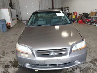 2000 Honda Accord EX z VIN 1HGCG1657YA053433, wystawiony jako IAAI lot #42322643 z przebiegiem 146 517 mil mil oraz . Historia ofert i sprzedaży dostępna na DreamBid. Obrazek 12.