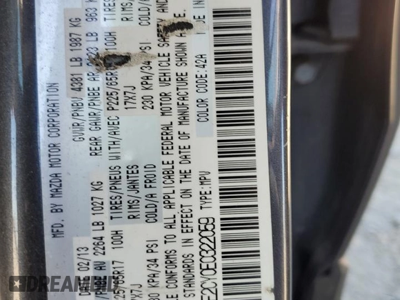 2014 Mazda CX-5 Touring with VIN JM3KE2CY0E0322059, listed as a Copart auction lot 48091805 with 212,889 mi miles and Salvage Title. Bid and sale history available at carsss.com. Image 13.