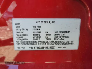 2021 Tesla Model Y Long Range with VIN 5YJYGAEE4MF260627, listed as a Copart auction lot 49091655 with 67,850 mi miles and Salvage Title. Bid and sale history available at DreamBid. Image 13.