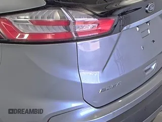 2020 Ford Edge Titanium z VIN 2FMPK4K91LBA91290, wystawiony jako IAAI lot #42494043 z przebiegiem 71 254 mil mil oraz . Historia ofert i sprzedaży dostępna na DreamBid. Obrazek 11.