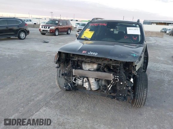 2021 Jeep Renegade Latitude with VIN ZACNJDBB0MPN13884, listed as a IAAI auction lot 40957052 with 52,023 mi miles. Bid and sale history available at carsss.com. Image 13.