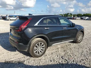 2019 Cadillac XT4 FWD Premium Luxury with VIN 1GYFZCR46KF117955, listed as a Copart auction lot 62145385 with 10,474 mi miles and Salvage title. Bid and sale history available at DreamBid. Image 3.