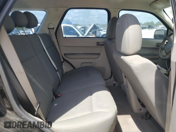 2009 Ford Escape XLS с VIN 1FMCU02709KD00730, выставлен на аукционе Copart как лот 54524405 с пробегом 120 523 миль миль и Списание • Salvage title. История ставок и продаж доступна на DreamBid. Изображение 11.