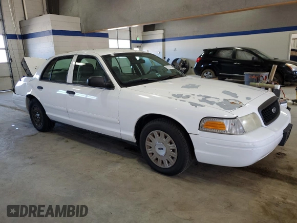 2005 Ford Police Interceptor с VIN 2FAHP71W35X144070, выставлен на аукционе Copart как лот 52170125 с пробегом 124 687 миль миль и Списание • Salvage title. История ставок и продаж доступна на DreamBid. Изображение 4.