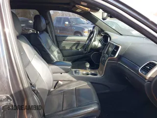 2015 Jeep Grand Cherokee Summit with VIN 1C4RJFJG8FC679185, listed as a IAAI auction lot 41653531 with 158,186 mi miles and . Bid and sale history available at DreamBid. Image 5.