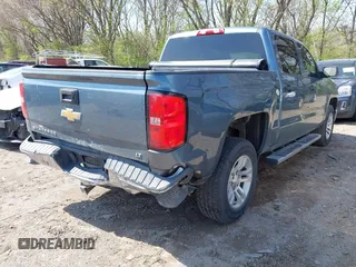 2014 Chevrolet Silverado 1500 LT with VIN 3GCUKREH9EG313565, listed as a IAAI auction lot 42003086 with 112,322 mi miles and . Bid and sale history available at DreamBid. Image 6.