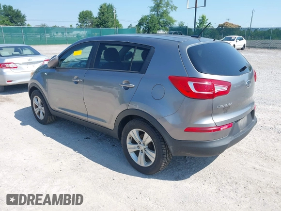2012 Kia Sportage LX with VIN KNDPBCA28C7237079, listed as a IAAI auction lot 42663554 with 245,420 mi miles and . Bid and sale history available at DreamBid. Image 3.