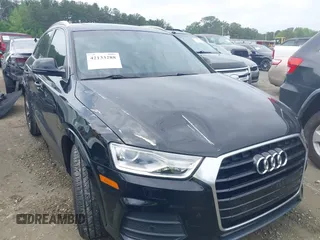 2016 Audi Q3 Premium Plus with VIN WA1BFCFSXGR022587, listed as a IAAI auction lot 42133288 with 141,609 mi miles. Bid and sale history available at carsss.com. Image 13.