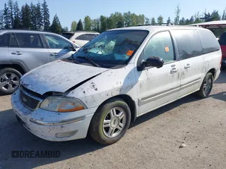 2002 Ford Windstar SE with VIN 2FMZA52452BA97162, listed as a IAAI auction lot 42090397 with 144,601 mi miles and . Bid and sale history available at carsss.com. Image 2.