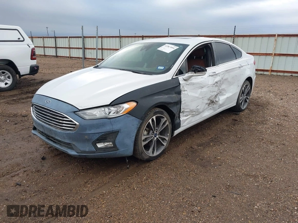 2019 Ford Fusion Titanium with VIN 3FA6P0D93KR138574, listed as a IAAI auction lot 41967094 with 118,297 mi miles. Bid and sale history available at carsss.com. Image 2.