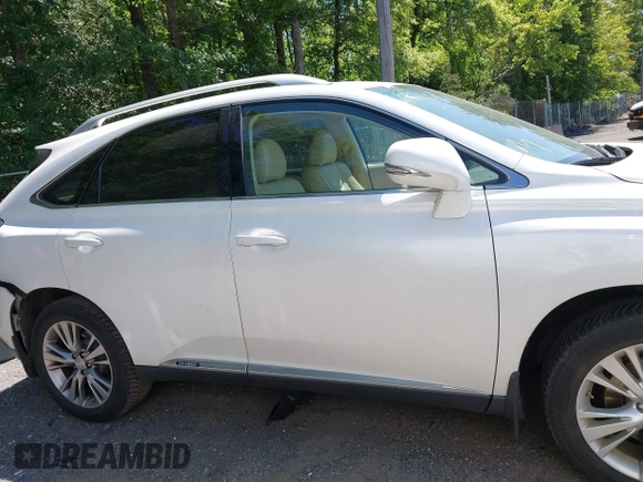 2013 Lexus RX 450h with VIN JTJBC1BA2D2060753, listed as a IAAI auction lot 42399012 with Not provided miles and . Bid and sale history available at DreamBid. Image 13.