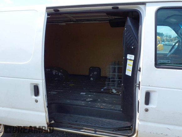 2010 Ford Econoline Cargo Commercial with VIN 1FTNE1EW8ADA91751, listed as a IAAI auction lot 42490967 with 208,704 mi miles and . Bid and sale history available at DreamBid. Image 8.