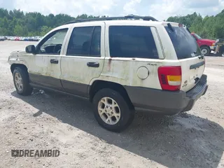 2001 Jeep Grand Cherokee Laredo with VIN 1J4GW48S81C520385, listed as a IAAI auction lot 42790086 with 190,617 mi miles and . Bid and sale history available at DreamBid. Image 3.