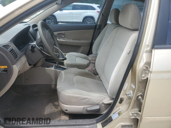 2009 Kia Spectra EX with VIN KNAFE221X95648679, listed as a Copart auction lot 55967485 with 182,740 mi miles and Non Repairable. Bid and sale history available at DreamBid. Image 7.