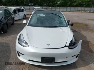 2023 Tesla Model 3 with VIN 5YJ3E1EA4PF644621, listed as a IAAI auction lot 42280312 with 41,262 mi miles and . Bid and sale history available at DreamBid. Image 12.