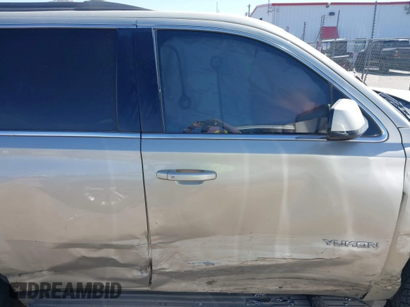 2015 GMC Yukon SLT with VIN 1GKS1BKC1FR145694, listed as a IAAI auction lot 41851644 with 162,592 mi miles. Bid and sale history available at carsss.com. Image 13.