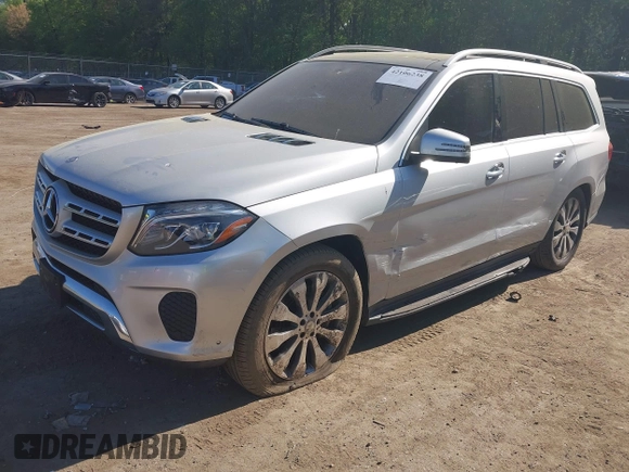 2017 Mercedes-Benz GLS 450 with VIN 4JGDF6EE8HA873584, listed as a IAAI auction lot 42106238 with 82,759 mi miles and . Bid and sale history available at DreamBid. Image 2.