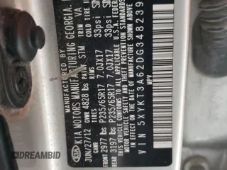 2013 Kia Sorento LX z VIN 5XYKT3A62DG348239, wystawiony jako Copart lot #52022165 z przebiegiem Nie podano mil oraz Szkoda całkowita • Salvage title. Historia ofert i sprzedaży dostępna na DreamBid. Obrazek 14.