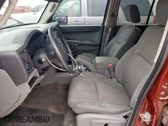 2007 Jeep Commander Sport z VIN 1J8HG48K27C697717, wystawiony jako Copart lot #53550395 z przebiegiem 288 452 mil mil oraz Szkoda całkowita • Salvage title. Historia ofert i sprzedaży dostępna na DreamBid. Obrazek 7.