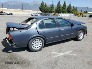 1999 Nissan Maxima GXE z VIN JN1CA21D9XM409448, wystawiony jako Copart lot #51822895 z przebiegiem Nie podano mil oraz Szkoda całkowita • Salvage title. Historia ofert i sprzedaży dostępna na DreamBid. Obrazek 3.