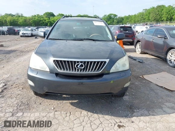 2008 Lexus RX with VIN 2T2HK31U28C063629, listed as a IAAI auction lot 42174790 with 204,595 mi miles. Bid and sale history available at carsss.com. Image 12.