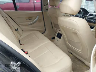 2015 BMW 3 Series 320i with VIN WBA3B1G57FNT05826, listed as a IAAI auction lot 42103193 with 128,800 mi miles. Bid and sale history available at carsss.com. Image 8.