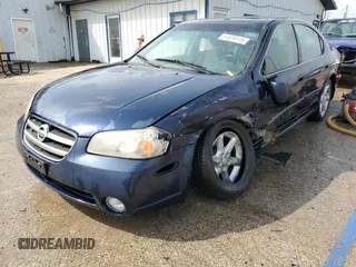 2002 Nissan Maxima GLE z VIN JN1DA31A52T301567, wystawiony jako Copart lot #51479115 z przebiegiem 122 327 mil mil oraz Szkoda całkowita • Salvage title. Historia ofert i sprzedaży dostępna na DreamBid. Obrazek 1.