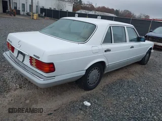 1989 Mercedes-Benz 420 Series 420SEL with VIN WDBCA35E4KA456613, listed as a IAAI auction lot 41145650 with 199,599 mi miles. Bid and sale history available at carsss.com. Image 4.