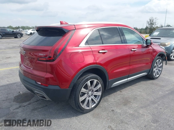 2021 Cadillac XT4 FWD Premium Luxury with VIN 1GYFZCR41MF043072, listed as a IAAI auction lot 41769251 with 31,053 mi miles. Bid and sale history available at carsss.com. Image 4.