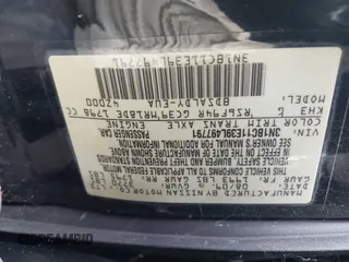 2009 Nissan Versa 1.8 S with VIN 3N1BC11E39L497791, listed as a IAAI auction lot 39679827 with 113,244 mi miles. Bid and sale history available at carsss.com. Image 9.
