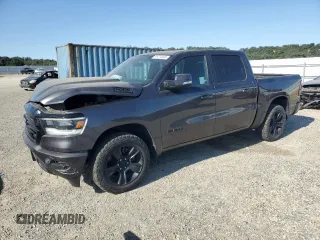 2020 Ram 1500 Lone Star with VIN 1C6SRFFTXLN130904, listed as a Copart auction lot 61274445 with 94,731 mi miles and Salvage title. Bid and sale history available at DreamBid. Image 1.