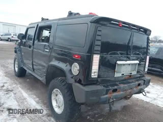 2003 Hummer H2 with VIN 5GRGN23UX3H106356, listed as a IAAI auction lot 41185603 with Not Provided miles. Bid and sale history available at carsss.com. Image 3.