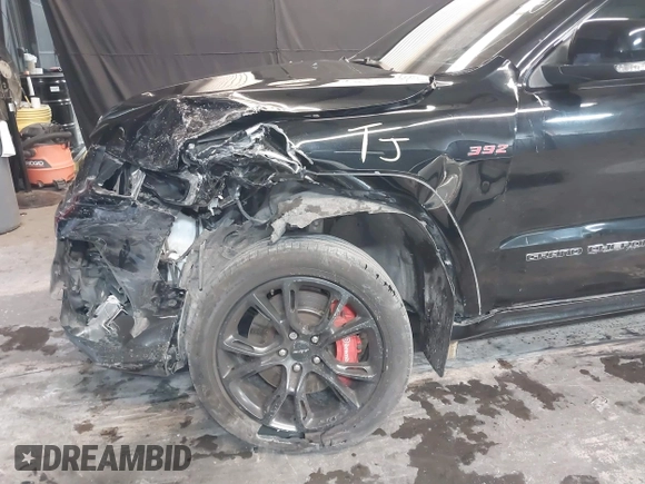 2017 Jeep Grand Cherokee SRT with VIN 1C4RJFDJ9HC819478, listed as a IAAI auction lot 41325490 with 63,551 mi miles. Bid and sale history available at carsss.com. Image 18.