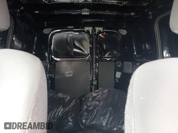 2021 Nissan NV200 SV with VIN 3N6CM0KN9MK695939, listed as a Copart auction lot 52696025 with 65,639 mi miles and Salvage title. Bid and sale history available at DreamBid. Image 10.