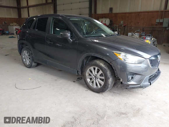 2015 Mazda CX-5 Touring with VIN JM3KE4CY6F0510002, listed as a IAAI auction lot 42045284 with 88,949 mi miles and . Bid and sale history available at DreamBid. Image 1.
