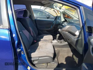 2009 Honda Fit with VIN JHMGE88279S071667, listed as a IAAI auction lot 42035664 with 235,791 mi miles. Bid and sale history available at carsss.com. Image 5.
