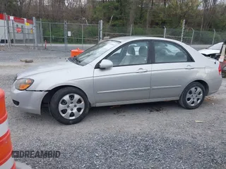 2009 Kia Spectra EX with VIN KNAFE221095622351, listed as a IAAI auction lot 41929653 with 178,034 mi miles. Bid and sale history available at carsss.com. Image 14.