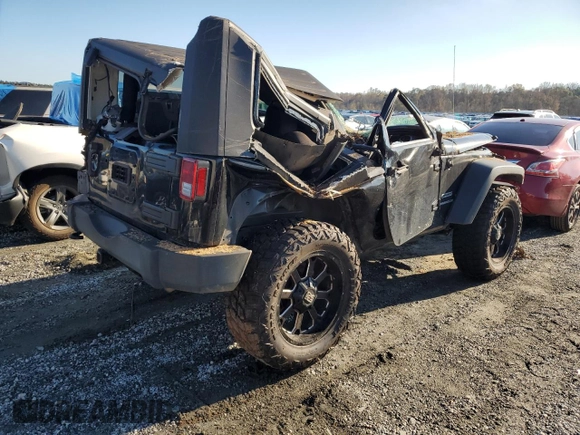 2015 Jeep Wrangler Willys Wheeler with VIN 1C4AJWAG8FL648645, listed as a Copart auction lot 74334884 with Not provided miles and Salvage title. Bid and sale history available at DreamBid. Image 3.
