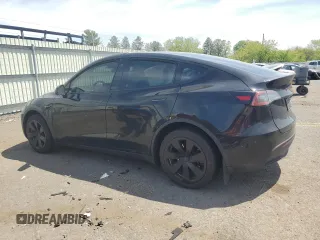 2023 Tesla Model Y Long Range z VIN 7SAYGDEE9PA115279, wystawiony jako Copart lot #55018275 z przebiegiem 43 026 mil mil oraz Szkoda całkowita • Salvage title. Historia ofert i sprzedaży dostępna na DreamBid. Obrazek 2.