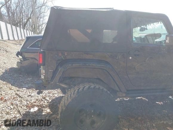 2015 Jeep Wrangler Sahara с VIN 1C4AJWBG7FL703858, выставлен на аукционе IAAI как лот 41720656 с пробегом 110 671 миль миль и . История ставок и продаж доступна на DreamBid. Изображение 21.