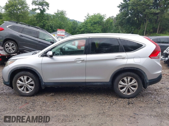 2013 Honda CR-V EX-L with VIN 2HKRM4H73DH618328, listed as a IAAI auction lot 42647497 with 200,667 mi miles and . Bid and sale history available at DreamBid. Image 15.