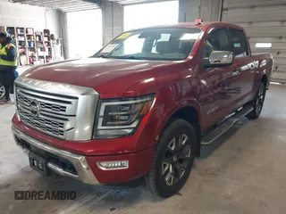 2021 Nissan Titan Pro-4X with VIN 1N6AA1ED9MN525986, listed as a IAAI auction lot 41795296 with 34,395 mi miles and . Bid and sale history available at DreamBid. Image 2.