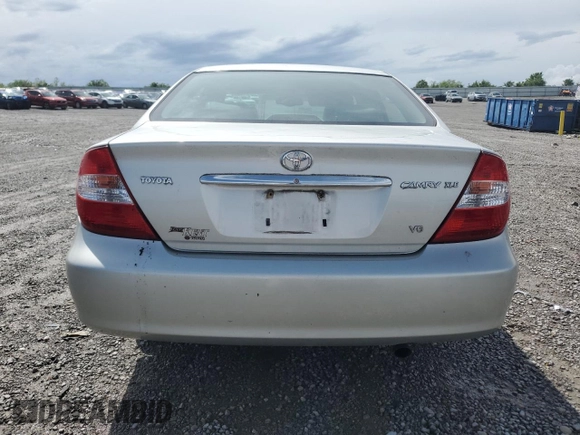 2004 Toyota Camry LE with VIN 4T1BF30K84U588220, listed as a Copart auction lot 54441185 with 165,890 mi miles and Non Repairable. Bid and sale history available at carsss.com. Image 6.