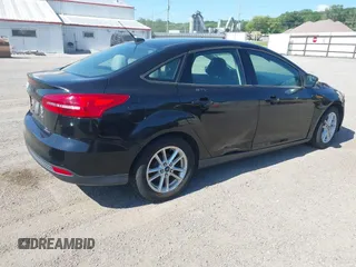 2016 Ford Focus SE with VIN 1FADP3F23GL235708, listed as a IAAI auction lot 42629556 with 139,777 mi miles and . Bid and sale history available at DreamBid. Image 4.