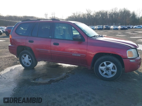 2002 GMC Envoy SLT with VIN 1GKDT13S222517064, listed as a IAAI auction lot 41590087 with 312,164 mi miles. Bid and sale history available at carsss.com. Image 13.