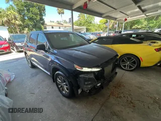 2019 Hyundai Santa Fe SE with VIN 5NMS23AD2KH096240, listed as a Copart auction lot 61690765 with 62,634 mi miles and Salvage title. Bid and sale history available at DreamBid. Image 1.