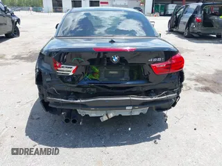 2016 BMW 4 Series 428i z VIN WBA3V7C54G5A25320, wystawiony jako IAAI lot #42318239 z przebiegiem 74 884 mil mil oraz . Historia ofert i sprzedaży dostępna na DreamBid. Obrazek 6.