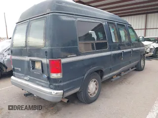1997 Ford Econoline Commercial with VIN 1FDEE1460VHB16721, listed as a IAAI auction lot 40968310 with 261,169 mi miles. Bid and sale history available at carsss.com. Image 4.